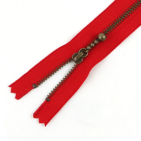 سحاب "قفل إبوشي بالخرز 20سم لون 519" YKK