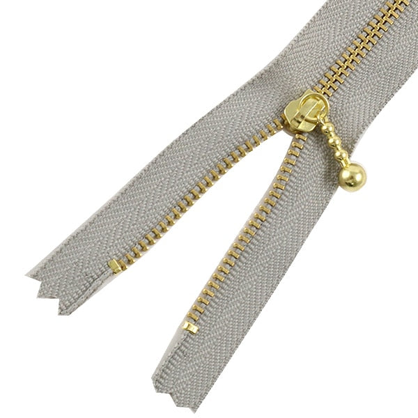 Молния "Золотой крепеж с мячом 14 см 576 цвет" YKK