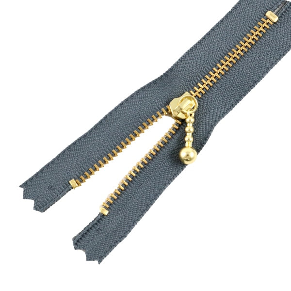 Fermeture éclair "Zipper en or avec balle 20cm 578 couleur" YKK