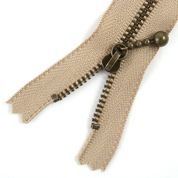 Reißverschluss "Goldbefestigungsmittel mit Ball 22 cm 573 Farbe" YKK