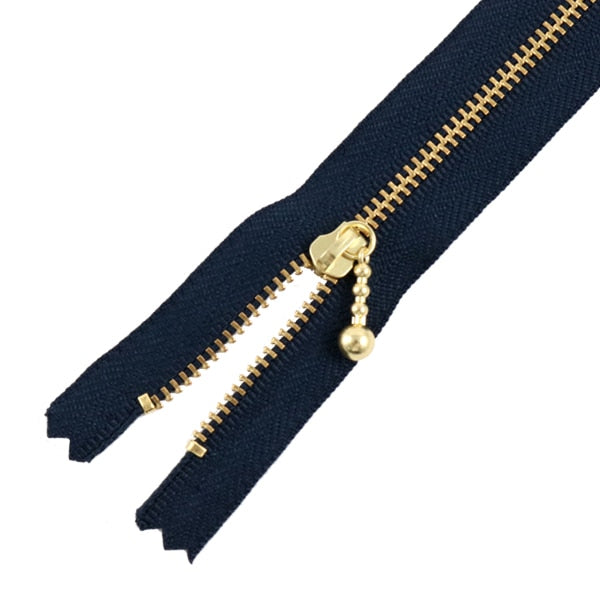 Fermeture éclair "Fixation en or avec balles 40cm 560 Couleur" YKK