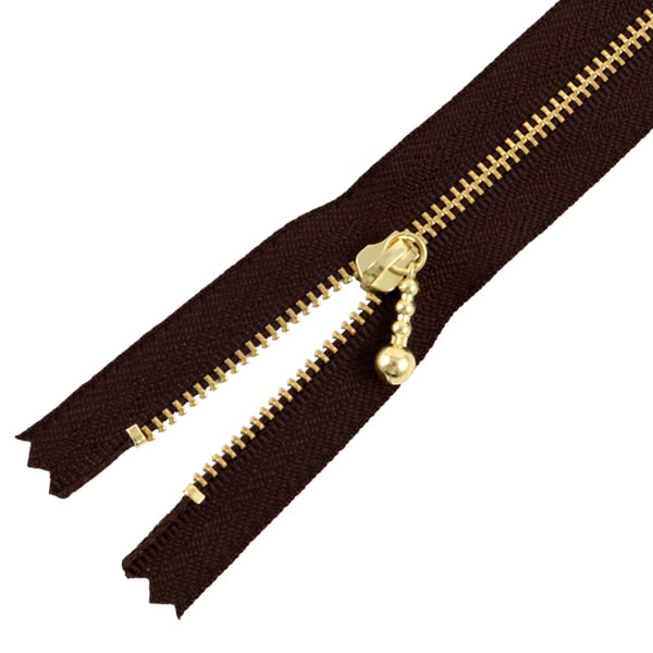 Fermeture éclair "Zippe dorée avec balles 40cm 570 couleur" YKK