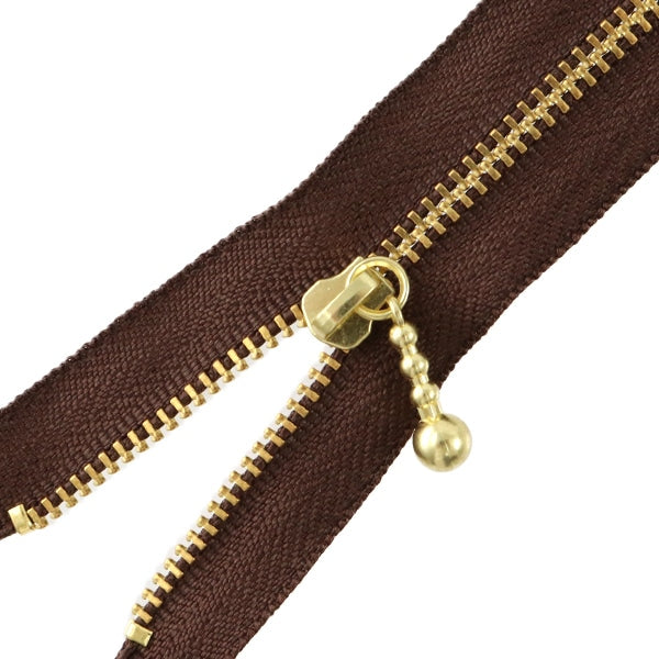 Cerniera "Oro con pallineCerniera 50 cm 570 colori DNDBL MGC33-50570" YKK