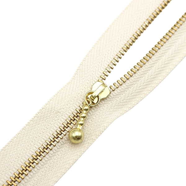 Fermeture éclair "Or avec des ballesFermeture éclair 20cm 571 Couleur 3MGC-20571" YKK