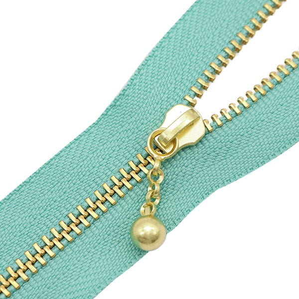 سحاب ``لون ذهبي مع الخرزسحاب 20 سم اللون 904 3MGC-20BLYZ” YKK