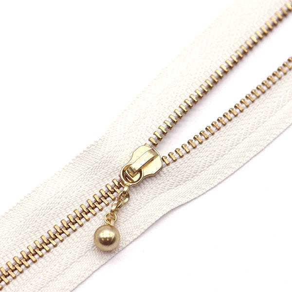 سحاب ``لون ذهبي مع الخرزسحاب 30 سم اللون 841 3MGC-30BLYZ” YKK