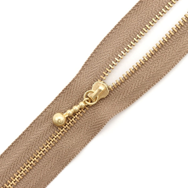 Fermeture éclair "Gold avec des boules de couleur nuanceFermeture éclair 20 cm 810 Couleur 3MGC-20BL" YKK