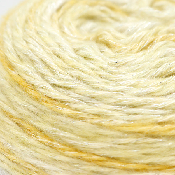 Close-up of Shiny Gradation No.16 Citrus Yellow yarn showing fine metallic strands and soft texture