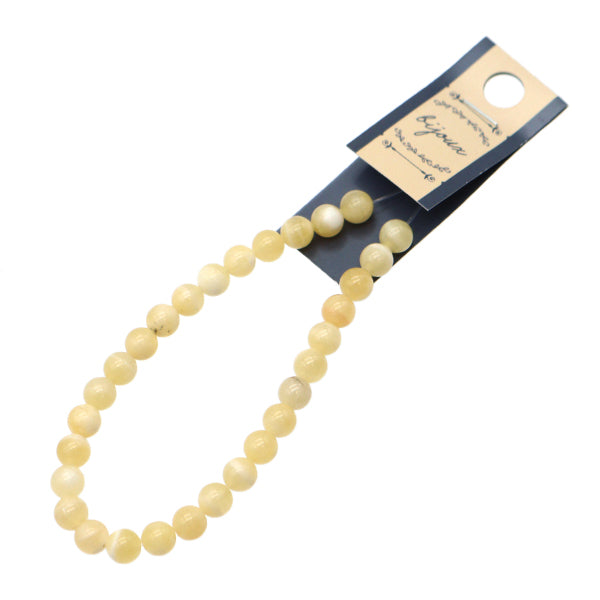 Аксессуарный материал "кальцит раундБисер Диаметр около 6 мм"