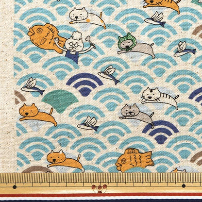 [Quantity starting from 5] Fabric "Cotton Linen Canvas Aoumi Nami Cat and Taiyaki Saxophone KTS7065-A" COTTON KOBAYASHI