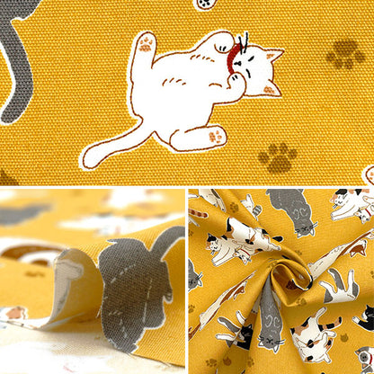 【数量5から】 生地 『オックス へそ天にゃんこ イエロー AP52903-2A』