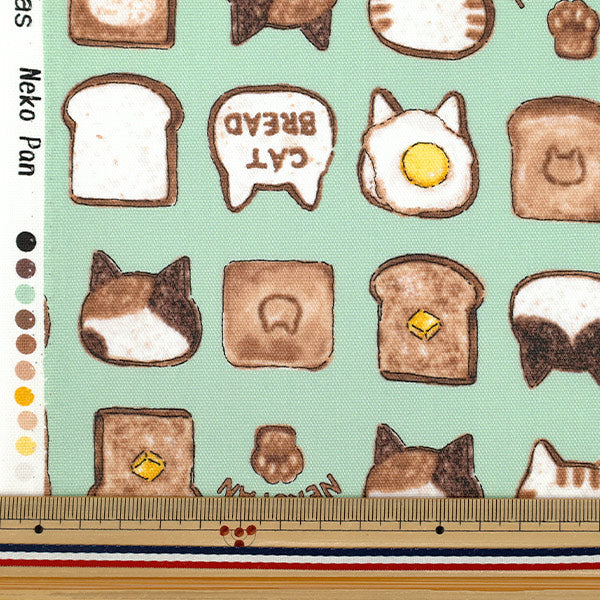 【数量5から】 生地 『オックス カラフルキャンバス ねこパン グリーン COCA-NP-GR』 KOKKA コッカ