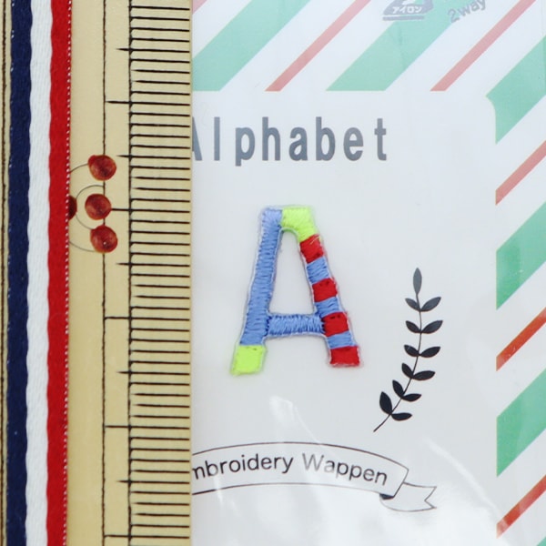 Patch "Mini -alfabettePatch Un YKW-4A" KOKKA