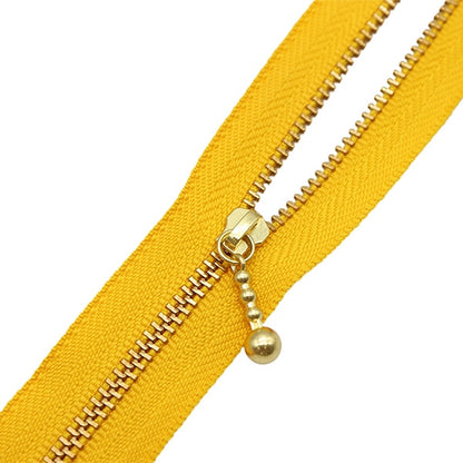Fermeture éclair "Or avec des ballesFermeture éclair 20 cm 506 Couleur 3MGC-20506" YKK
