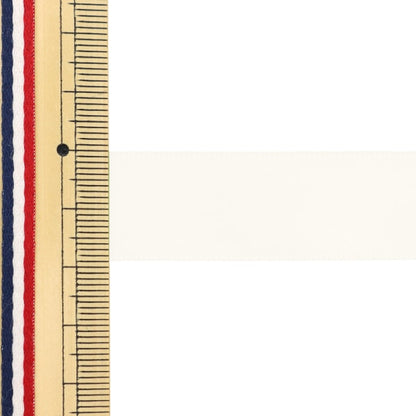 الشريط ``بوليستر ساتان على الوجهينالشريط عاجي 19 مم × 3 م"