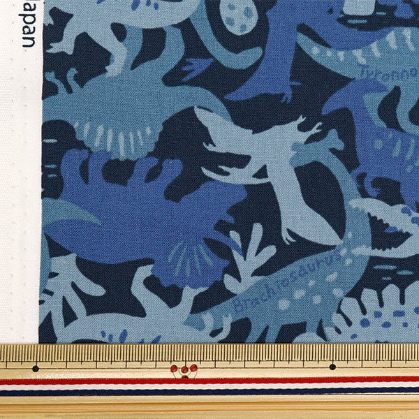 [From quantity 5] Fabric 『Sheeting Colorful canvas camouflage dinosaur navy cocan-ldin-nv] KOKKA