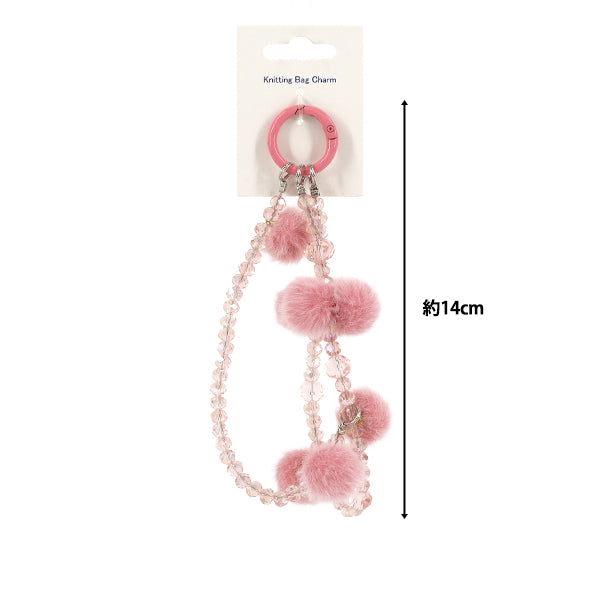 Articles ménagers ``Bijou de sac tricot type pompon rose"