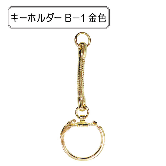 Kunsthandwerksklammer "Schlüsselbund B-1 Gold"