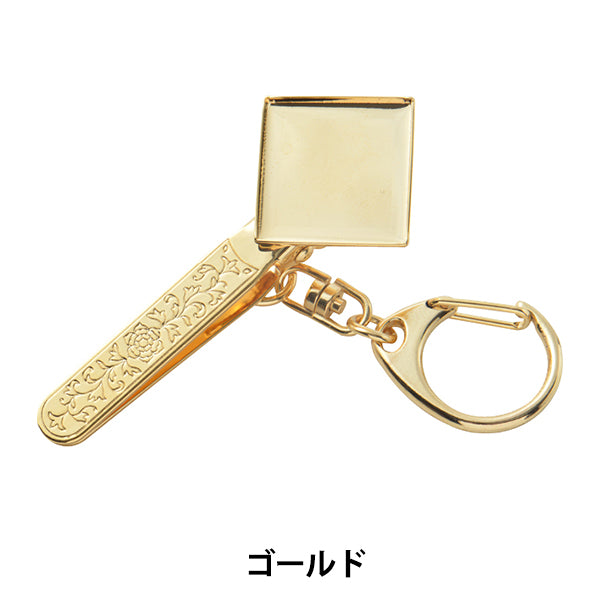 Staffa artigianale "Porta del tasto borsetto quadrata 21mm oro"