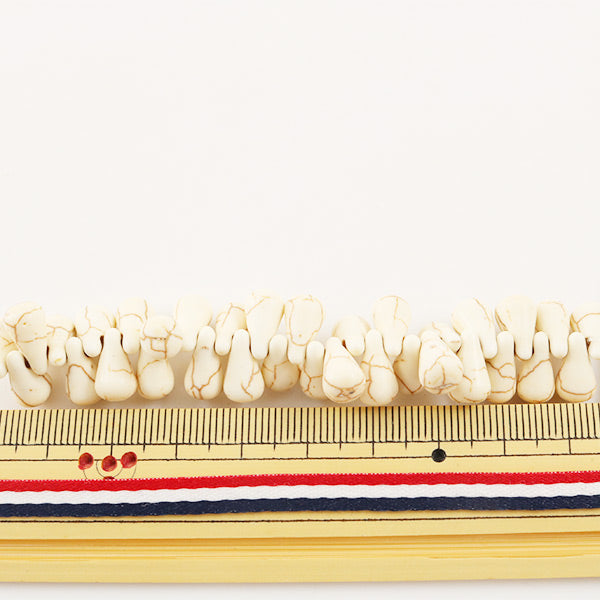 خرز ``النمط الفيروزيخرز هاولايت 6 مم × 9 مم"