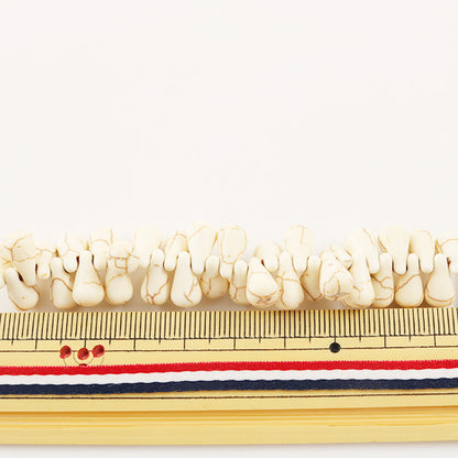 خرز ``النمط الفيروزيخرز هاولايت 6 مم × 9 مم"