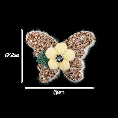 Handwerksteile "FangirlingDekorationsteile Tweed Butterfly Braun 10-5534"