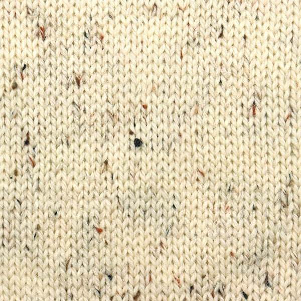 Close-up of Alpaca Tweed Color 11 showing blended tweed fibers
