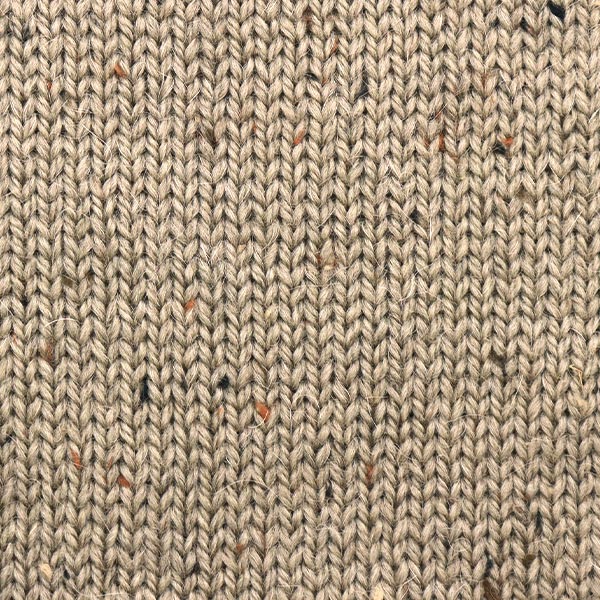 Close-up of Alpaca Tweed Color 12 showing blended tweed fibers